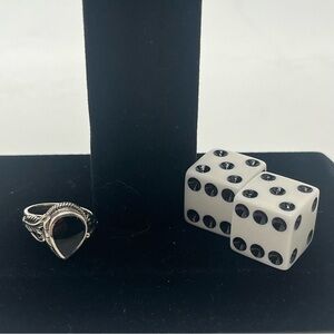 sterling silver poison ring with a black stone tested as tourmaline